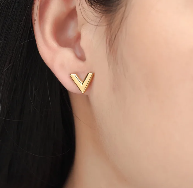 18K gold plated V earrings worn close up Saudi Arabia Jewelique