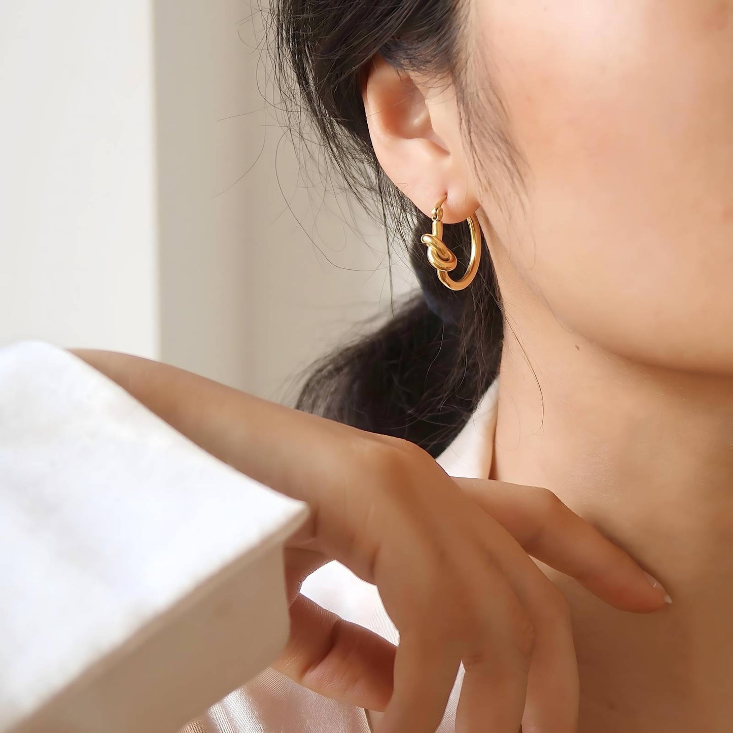 18K gold plated knot earrings side view Saudi Arabia Jewelique