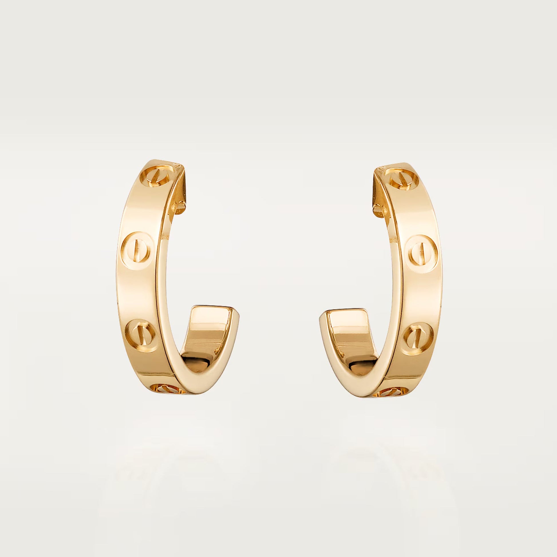 18K gold plated screw earrings gold stainless steel Saudi Arabia Jewelique